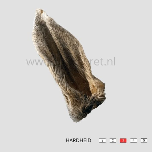 Hertenoor met haar voor honden. 100% natuurlijke, hypoallergene kauwsnack die helpt bij darmreiniging en gebitsverzorging. Perfect als gezonde snack